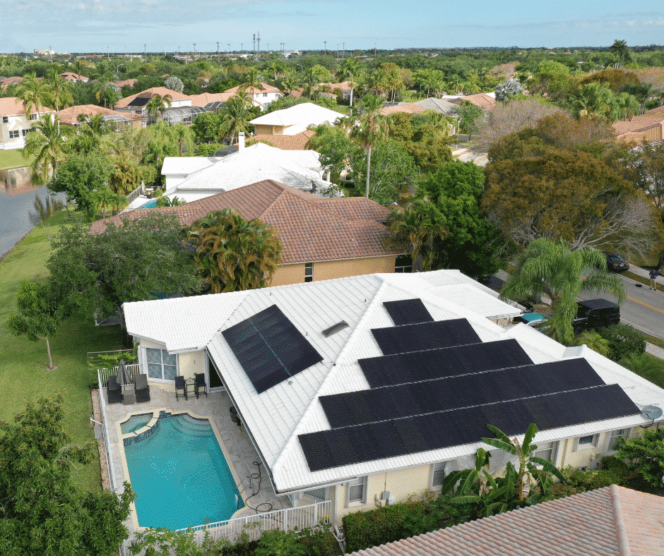 aerial view of solar panels on a white roof