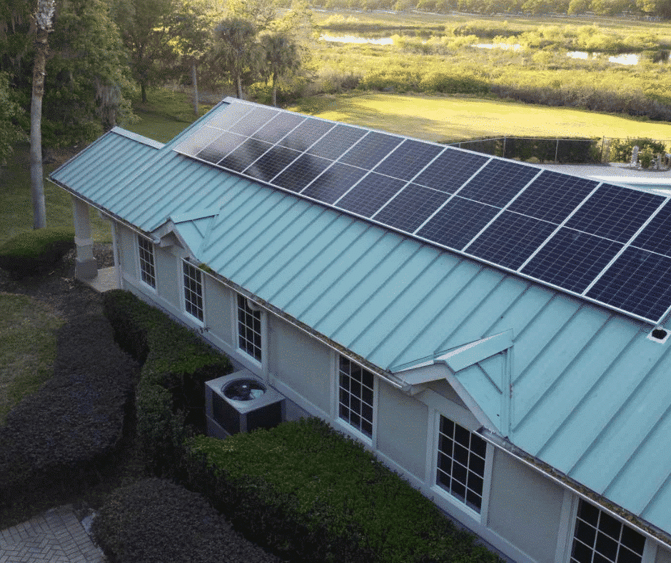 solar panels on a turquoise roof