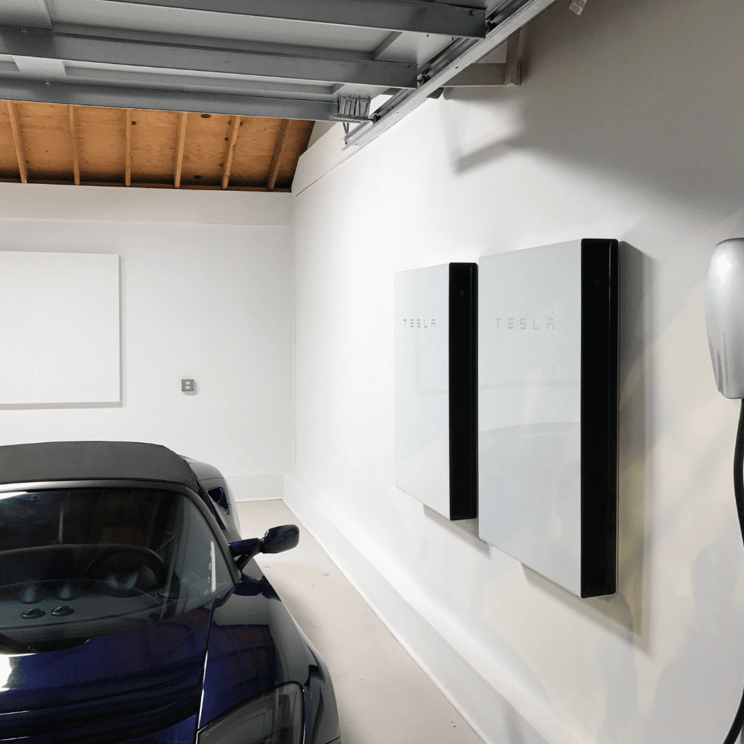 two powerwalls on a garage wall