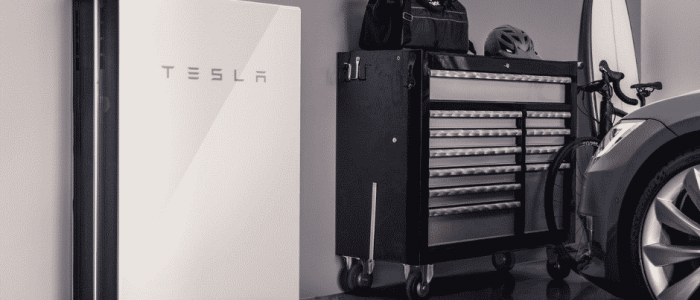 single tesla powerwall in a garage