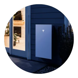 Tesla Powerwall 3 outside of a home