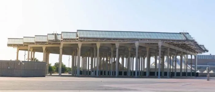 ground view of solar panels on a pergola